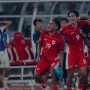 Pemain Timnas Indonesia (jersey merah-putih) merayakan gol atau kemenangan, menunjukkan semangat juang tim untuk SEA Games.