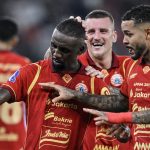 Selebrasi pemain Persija Jakarta dalam pertandingan Liga 1 Super League.