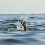 drowning-woman-reaching-help-sea-260nw-2027404340