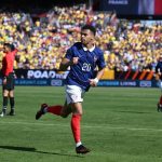 Desire Doue merayakan gol saat pertandingan timnas Prancis melawan Kolombia di stadion yang dipadati penonton.