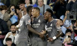 hasil-liga-spanyol-real-madrid-vs-celta-vigo.jpg Selebrasi gol Kylian Mbappe, Vinicius Junior, dan Antonio Rudiger dalam pertandingan Liga Spanyol Real Madrid melawan Celta Vigo.