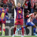 Ekspresi kecewa pemain Barcelona Eric Garcia dan Pedri setelah pertandingan melawan Atletico Madrid di Liga Champions.