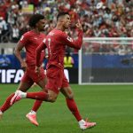 Cristiano Ronaldo melakukan selebrasi setelah mencetak gol untuk timnas Portugal melawan Uzbekistan