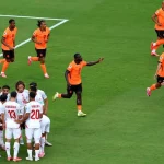 Para pemain Timnas Belanda merayakan gol ke gawang Tunisia di lapangan sepak bola