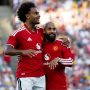 Selebrasi para pemain Manchester United usai mengunci kemenangan dramatis atas Leeds United lewat adu penalti.