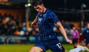 debut-elkan-baggott-berbuah-manis-millwall-menang-carabao-cup.webp Aksi bek Timnas Indonesia, Elkan Baggott, yang tampil impresif pada laga debutnya bersama Millwall saat meraih kemenangan di ajang Carabao Cup.