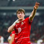 ole-romeny-selebrasi-gol-timnas-indonesia-fifa-asean-cup-2026.webp Ole Romeny mengenakan jersey Timnas Indonesia nomor punggung 10 merayakan gol di laga FIFA ASEAN Cup 2026