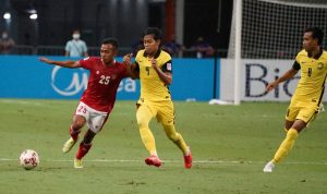 timnas-indonesia-vs-malaysia-fifa-asean-cup-2026.webp Aksi sengit pemain Timnas Indonesia saat berebut bola dengan pemain Malaysia di laga FIFA ASEAN Cup 2026.