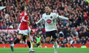 Selebrasi pemain Bournemouth setelah mencetak gol saat mengalahkan Manchester United 0-3.