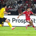 peringkat-klasemen-fifa-asean-cup-2026-indonesia.webp Pemain Timnas Indonesia nomor punggung 21 menguasai bola di tepi lapangan saat berlaga di FIFA ASEAN Cup 2026
